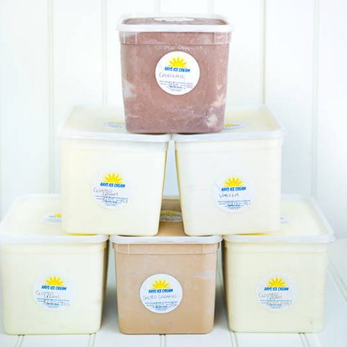 4L wholesale tubs of Rays Home Made Ice Cream stacked in a pyramid